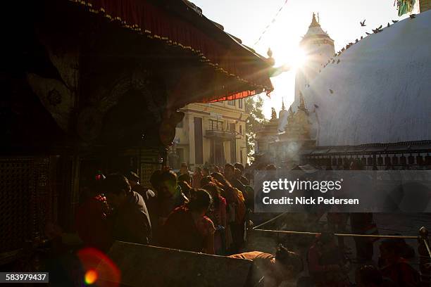 sunrise worshippers at swayambhunath - katmandu stock pictures, royalty-free photos & images