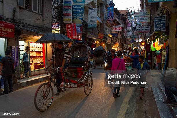 ricksha in thamel, kathmandu - pedicab stock pictures, royalty-free photos & images