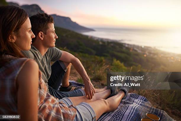 nothing more soothing than the sight of nature - couple looking at view stock pictures, royalty-free photos & images