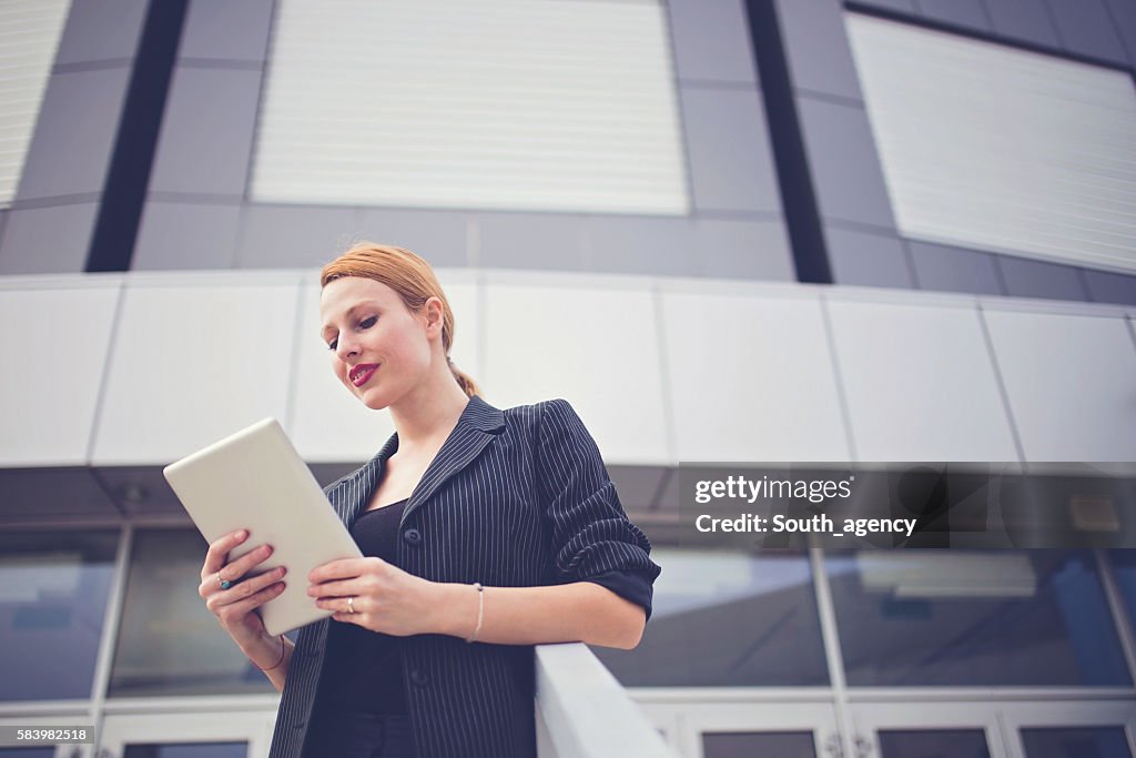 Business lady with tablet