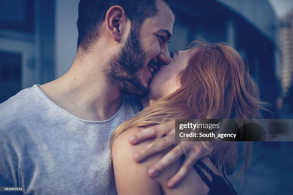 Couple hug and kiss