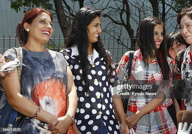 Japan - Radha Mainali and her second daughter Alisha and eldest daughter Mithila are interviewed in Yokohama on June 8 after meeting Radha's husband,...