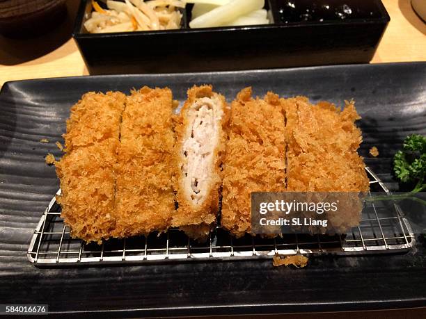 tonkatsu (pork cutlet) closed-up - tonkatsu stock pictures, royalty-free photos & images