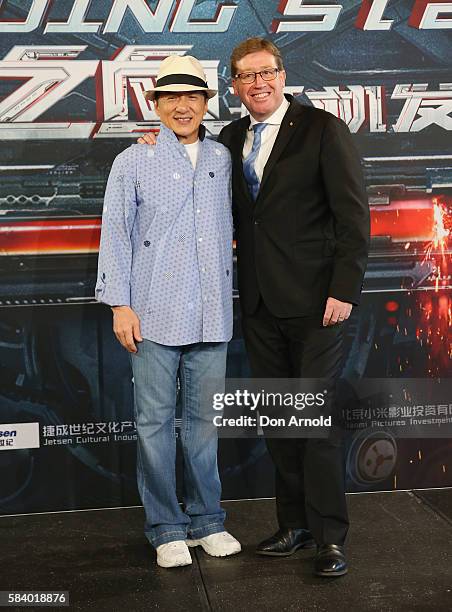 Jackie Chan and Troy Grant pose during a press conference and photocall for Bleeding Steel at Sydney Opera House on July 28, 2016 in Sydney,...