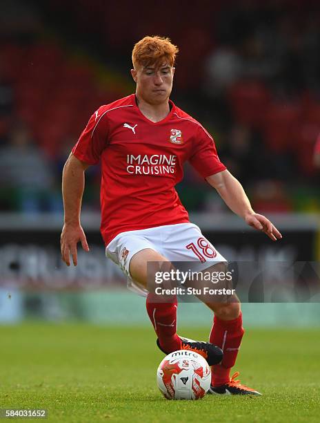 Tom Smith of Swindon Town in action during the Pre Season friendly between Swindon Town and Swansea City at County Ground on July 27, 2016 in...