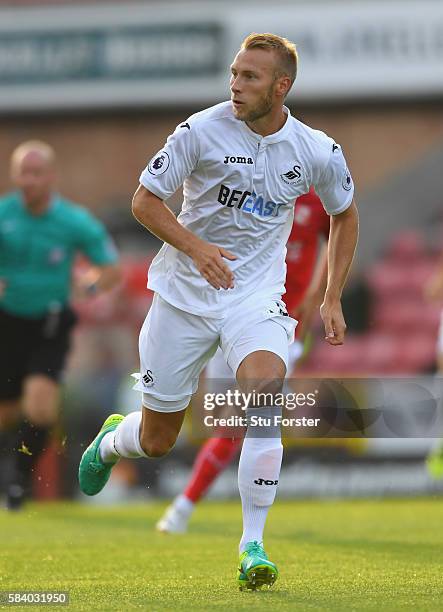 Mike Van der Hoorn of Swansea City in action during the Pre Season friendly between Swindon Town and Swansea City at County Ground on July 27, 2016...