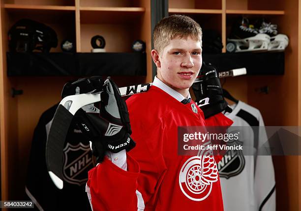 Dennis Cholowski, selected 20th overall by the Detroit Red Wings, poses for a portrait during round one of the 2016 NHL Draft at First Niagara Center...