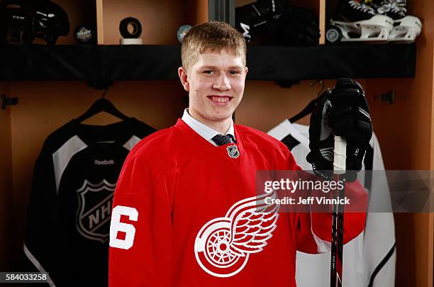Dennis Cholowski, selected 20th overall by the Detroit Red Wings, poses for a portrait during round one of the 2016 NHL Draft at First Niagara Center...