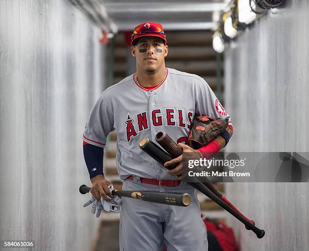 Yunel Escobar of the Los Angeles Angels of Anaheim walks through the clubhouse tunnel while taking the field for the game against the Boston Red Sox...