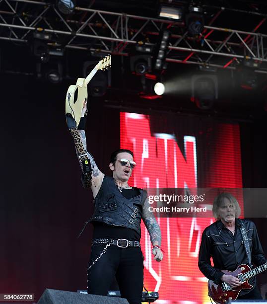 Ricky Warwick and Scott Gorham of Thin Lizzy perform at Ramblin Man Fair at Mote Park on July 23, 2016 in Maidstone, England.