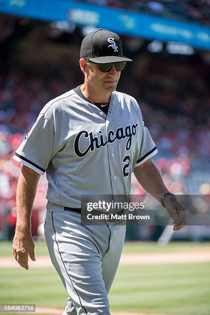 Manager Robin Ventura of the Chicago White Sox returns to the dugout after arguing a call during the ninth inning of the game against the Los Angeles...