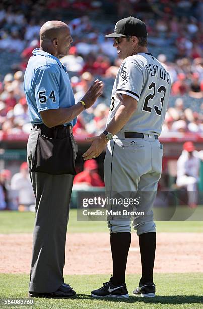 Manager Robin Ventura of the Chicago White Sox argues with umpire CB Bucknor during the ninth inning of the game against the Los Angeles Angels of...