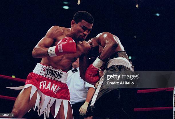 Raul Frank lands a punch in Vernan Forrest's belly during the fight at Madison Square Garden in New York, New York. Frank defeated Forrest in the...