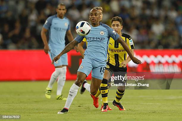 Fabian Delph of Manchester City contests the ball against Emre Mor of Borussia Dortmund during the 2016 International Champions Cup match between...