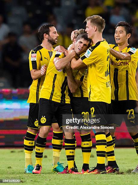 Christian Pulisic of Borussia Dortmund celebrates after scoring the goal to the 1:1 during the International Champions Cup China match between...