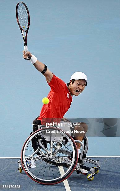 Shingo Kunieda of Japan competes against Stephane Houdet of France in the Men's wheelchair tennis gold medal match on day 10 of the London 2012...