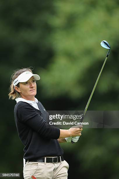 Gwladys Nocera of France hits her second shot on the 1st hole during the first round of the 2016 Ricoh Women's British Open on July 28, 2016 in...
