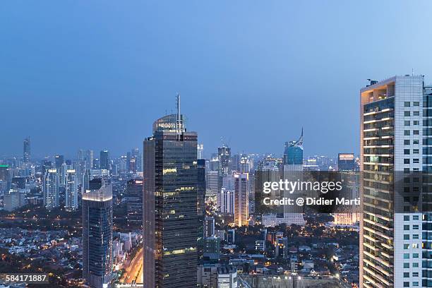 jakarta cityscape - newly industrialized country stock pictures, royalty-free photos & images