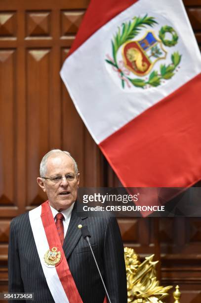 Pedro Pablo Kuczynski gives a speech after sworning in as Perus President, at the National Congress building in Lima on July 2016. - Kuczynski, who...