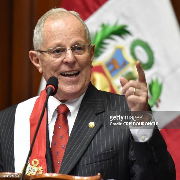 Pedro Pablo Kuczynski gives a speech after swearing in as Perus President, at the National Congress building in Lima on July 2016. - Kuczynski, who...