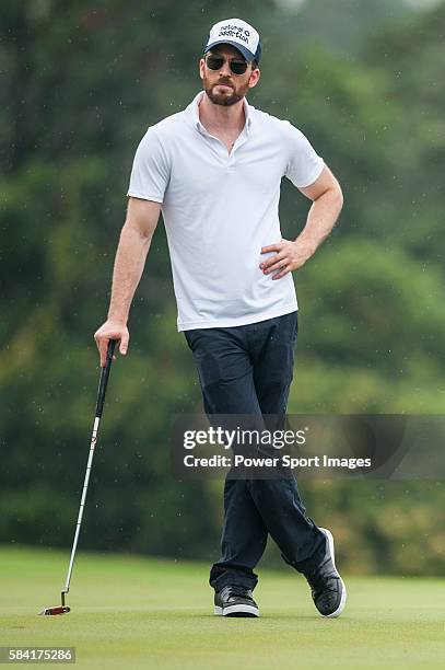 American actor Chris Evans in action during the Mission Hills Celebrity Pro-Am on 25 October 2014, in Haikou, China.