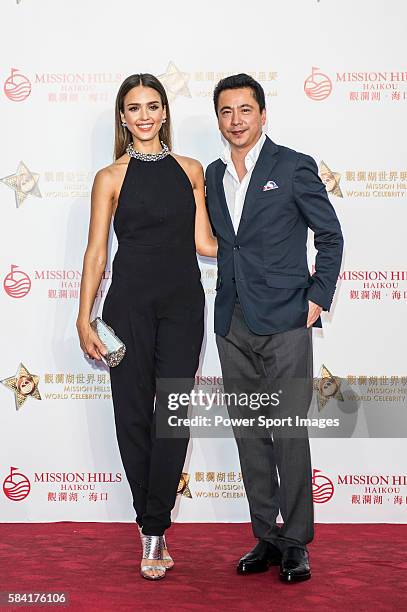American actress Jessica Alba and Wang Zhonglei arrive at the Red Carpet welcome during the opening ceremony of the Mission Hills Celebrity Pro-Am on...