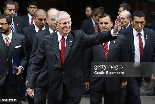 Pedro Pablo Kuczynski, president of Peru, waves as he goes to be sworn in, in Lima, Peru, on Thursday, July 28, 2016. The inauguration of Wall...