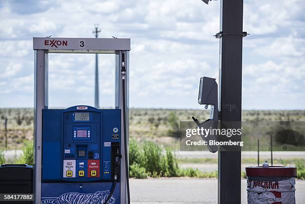 Gas pump stands at a roadside Exxon gas station outside Aurora, New Mexico, U.S., on Tuesday, July 26, 2016. Exxon Mobil Corp. Is scheduled to...