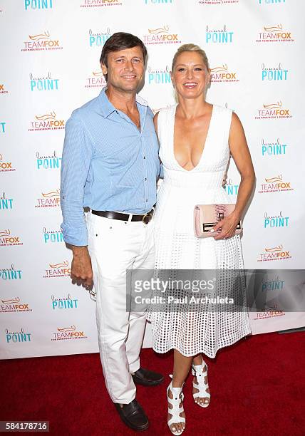 Actors Grant Show and Katherine LaNasa attend the "Raising The Bar To End Parkinson's" at Laurel Point on July 27, 2016 in Studio City, California.