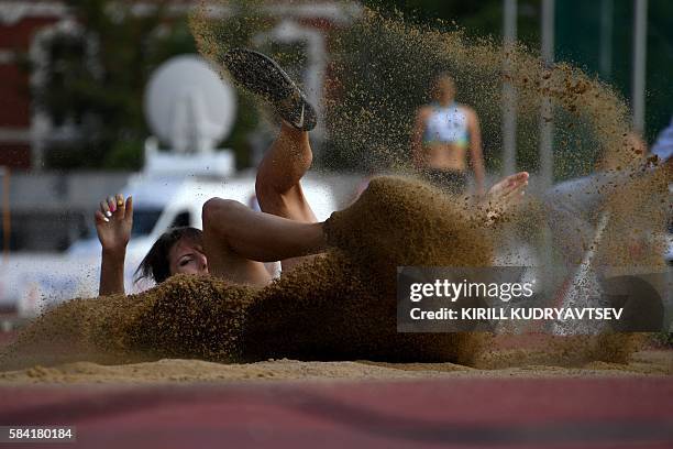 Russia's Yuliya Pidluzhnaya competes in the womens long jump final at a track and field meet called "Stars of 2016" in Moscow on July 28, 2016....