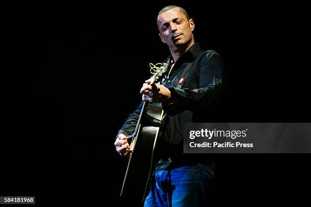 Alex Britti performing live at Teatro Colosseo for his "Chitarra Voce Piede" tour 2014.