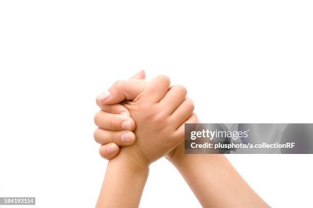 two kids arm wrestling - plusphoto stock pictures, royalty-free photos & images