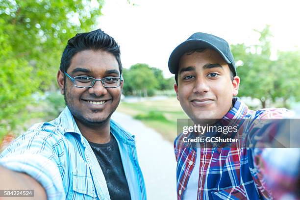 friends for life! - united arab emirates university stock pictures, royalty-free photos & images