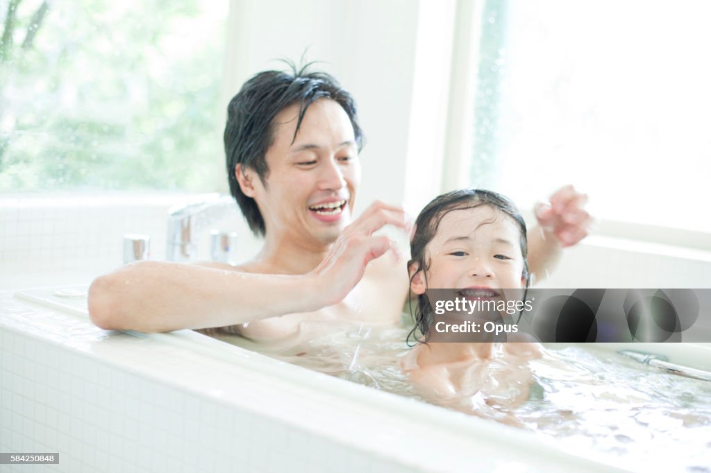 Father and son taking a bath, Hyogo Prefecture, Honshu, Japan