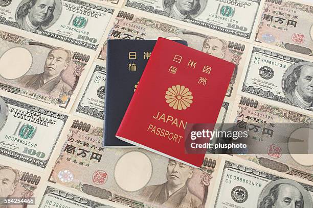 japanese passports on japanese paper notes - plusphoto stock pictures, royalty-free photos & images