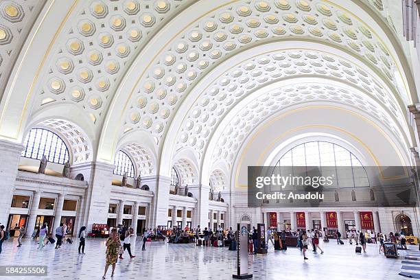 Visitors and travelers move through the Main Hall of Union Station in Washington, USA on July 28, 2016.