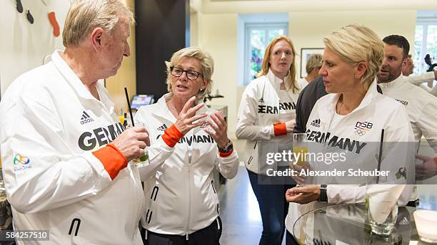 Horst Hrubesch, Silvia Neid and Doris Fitschen during a dinner attended by Germany's Olympic Men's and Women's soccer teams on July 28, 2016 in...