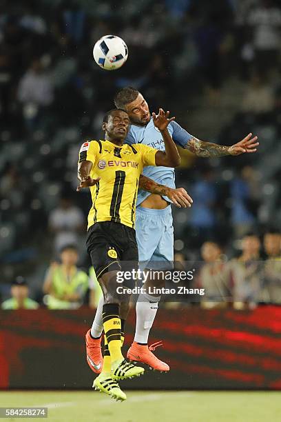 Aleksandar Kolarov of Manchester City contests the ball against Sokratis Papastathopoulos of Borussia Dortmund during the 2016 International...