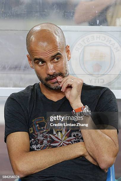 Manchester City's manager Pep Guardiola looks on during the 2016 International Champions Cup match between Manchester City and Borussia Dortmund at...