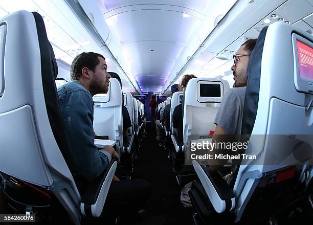 Taylor Rice and Ryan Hahn of Local Natives attend their live, acoustic set at 35,000 feet on Virgin America Flight ahead of Lollapallooza held on...