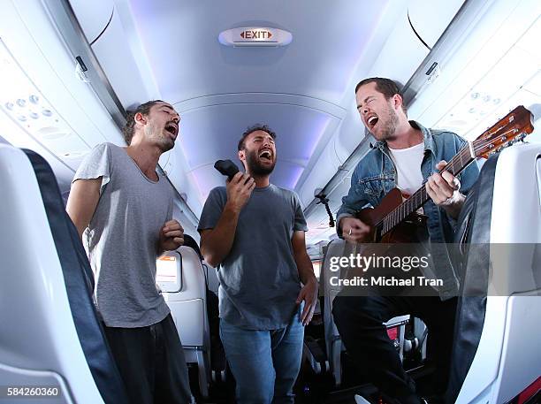 Taylor Rice, Kelcey Ayer and Ryan Hahn of Local Natives perform live, acoustic set at 35,000 feet on Virgin America Flight ahead of Lollapallooza...