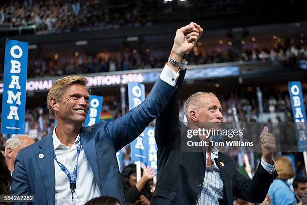 Rep. Sean Patrick Maloney, D-N.Y., right, and his husband Randy Florke, are seen on the floor of the Wells Fargo Center in Philadelphia, Pa., on the...