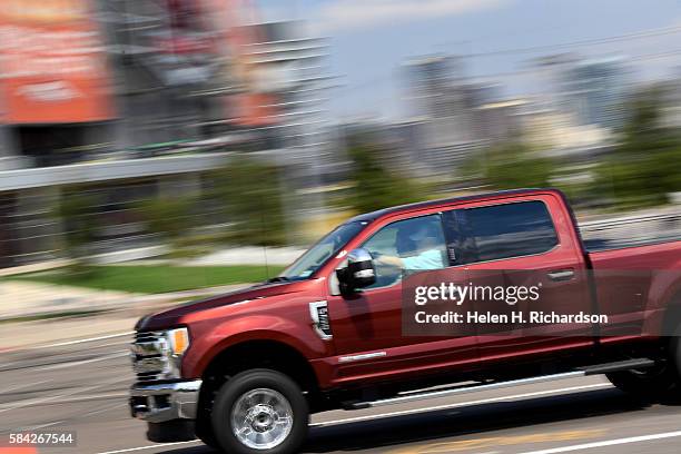 People had the chance to test drive some of the newest Ford F-Series Super Duty trucks in the parking lot of Sports Authority Field at Mile High on...