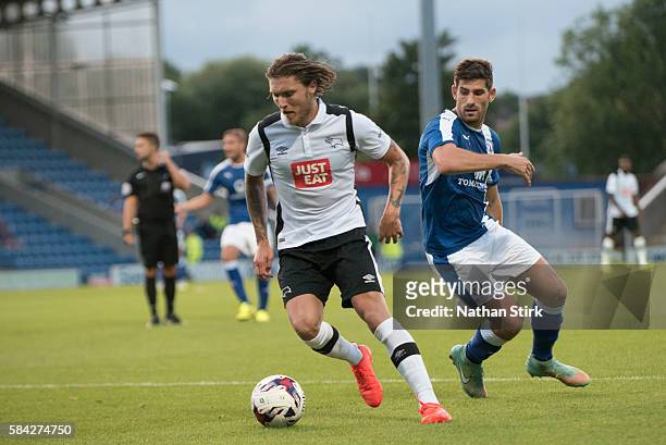 Jeff Hendrick of Derby County and Ched Evans of Chesterfield battle for the ball during the Pre-Season Friendly between Chesterfield and Derby County...