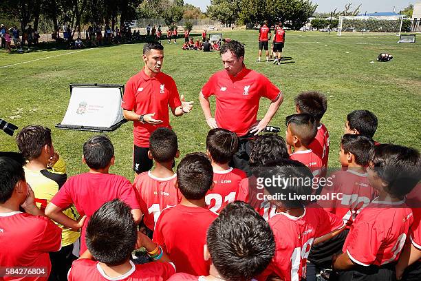 Former Liverpool players Luis Garcia and Robbie Fowler host a kids soccer clinic at the Addison-Penzak Jewish Community Center during the Liverpool...