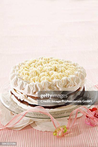 chocolate layer cake with meringue - cream cake stock pictures, royalty-free photos & images