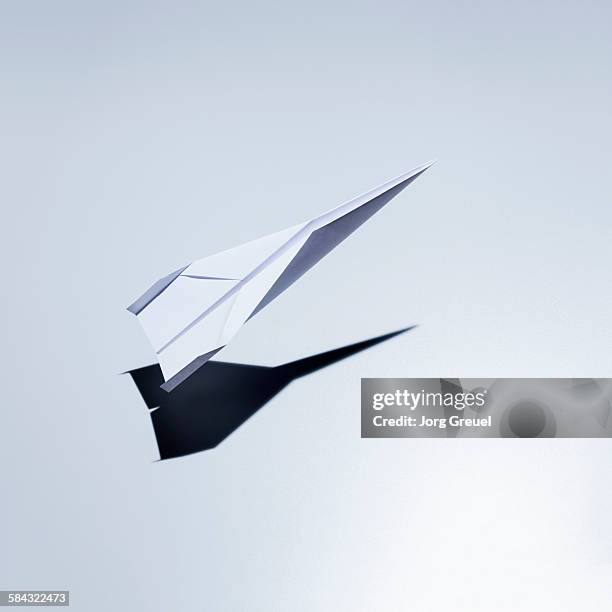 paper plane taking off - launch ストックフォトと画像