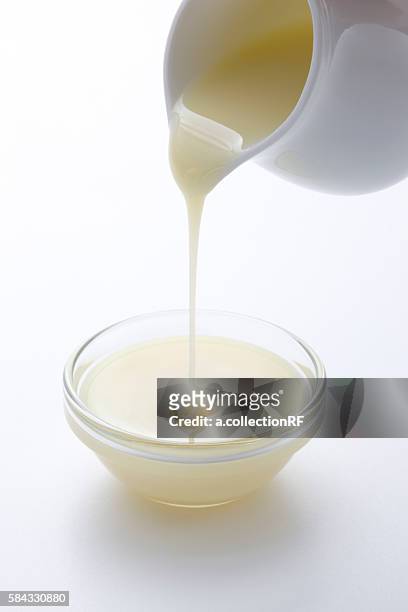 condensed milk - condensed milk foto e immagini stock