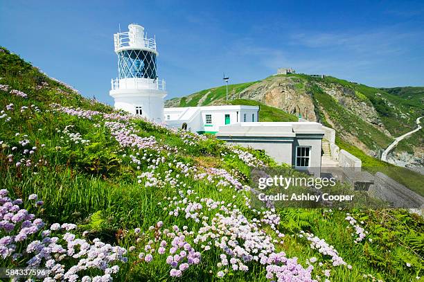 the new lighthouse on lundy island devon uk - devon stock pictures, royalty-free photos & images