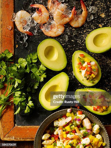 shrimp and pico stuffed avocados - stuffed avocado stock pictures, royalty-free photos & images